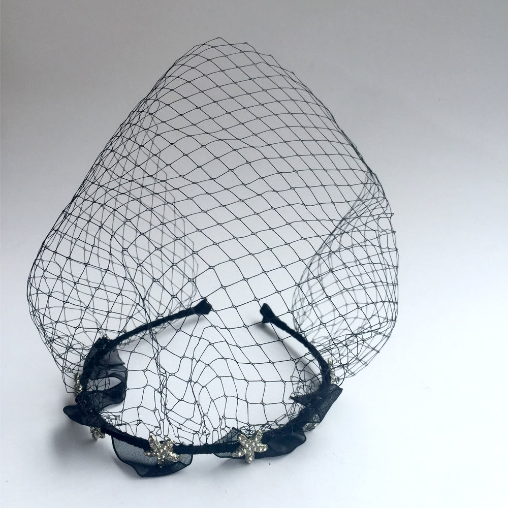 Custom order headpiece and hair accessory by Curtain Road